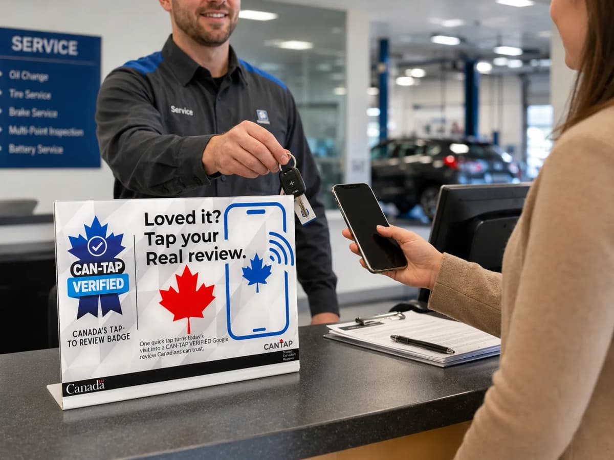 CAN-TAP VERIFIED NFC Google review sign at an automotive service counter during a customer key handoff in Niagara Falls, Ontario.