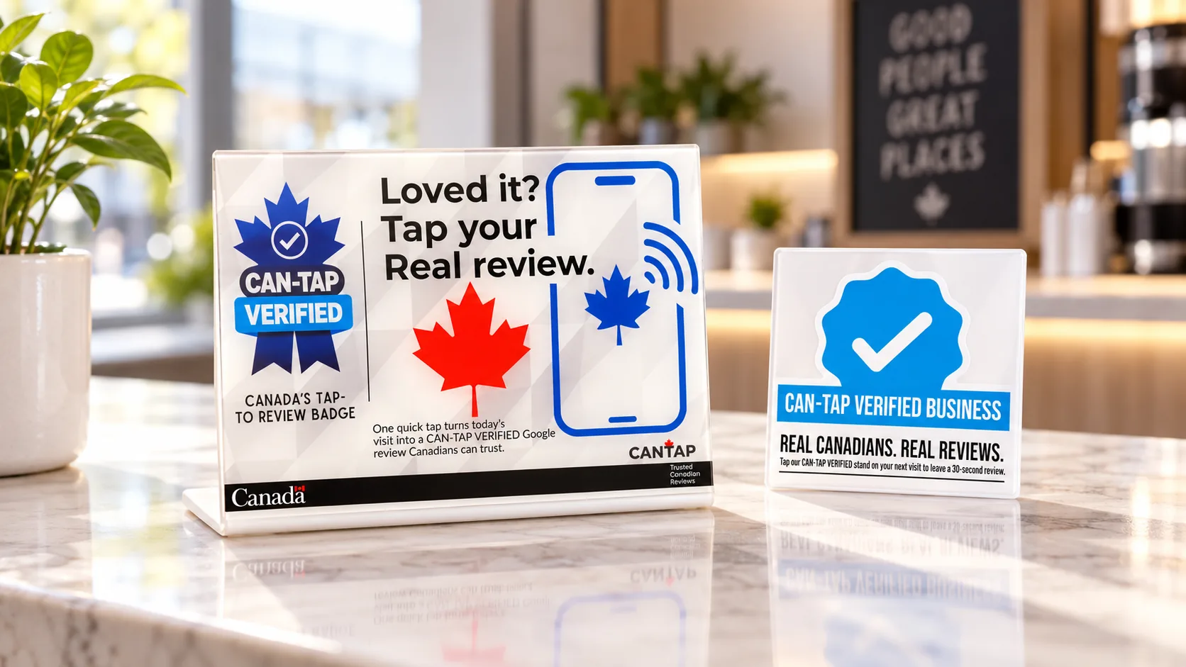 CAN-TAP counter stand and blue-check door badge on a café counter