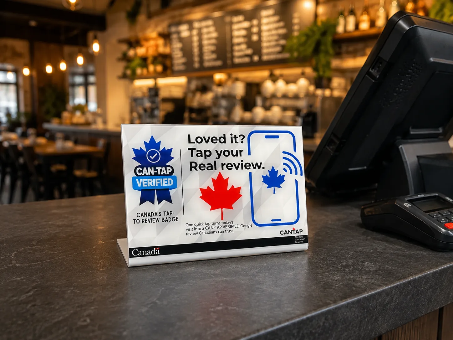 CAN-TAP VERIFIED NFC review sign beside a restaurant point-of-sale terminal in Niagara Region, Ontario.